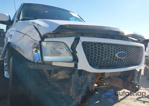 2002 Ford F-150 Lariat/Xlt z USA, uszkodzony, nr VIN 1FTRW07L52KD74438